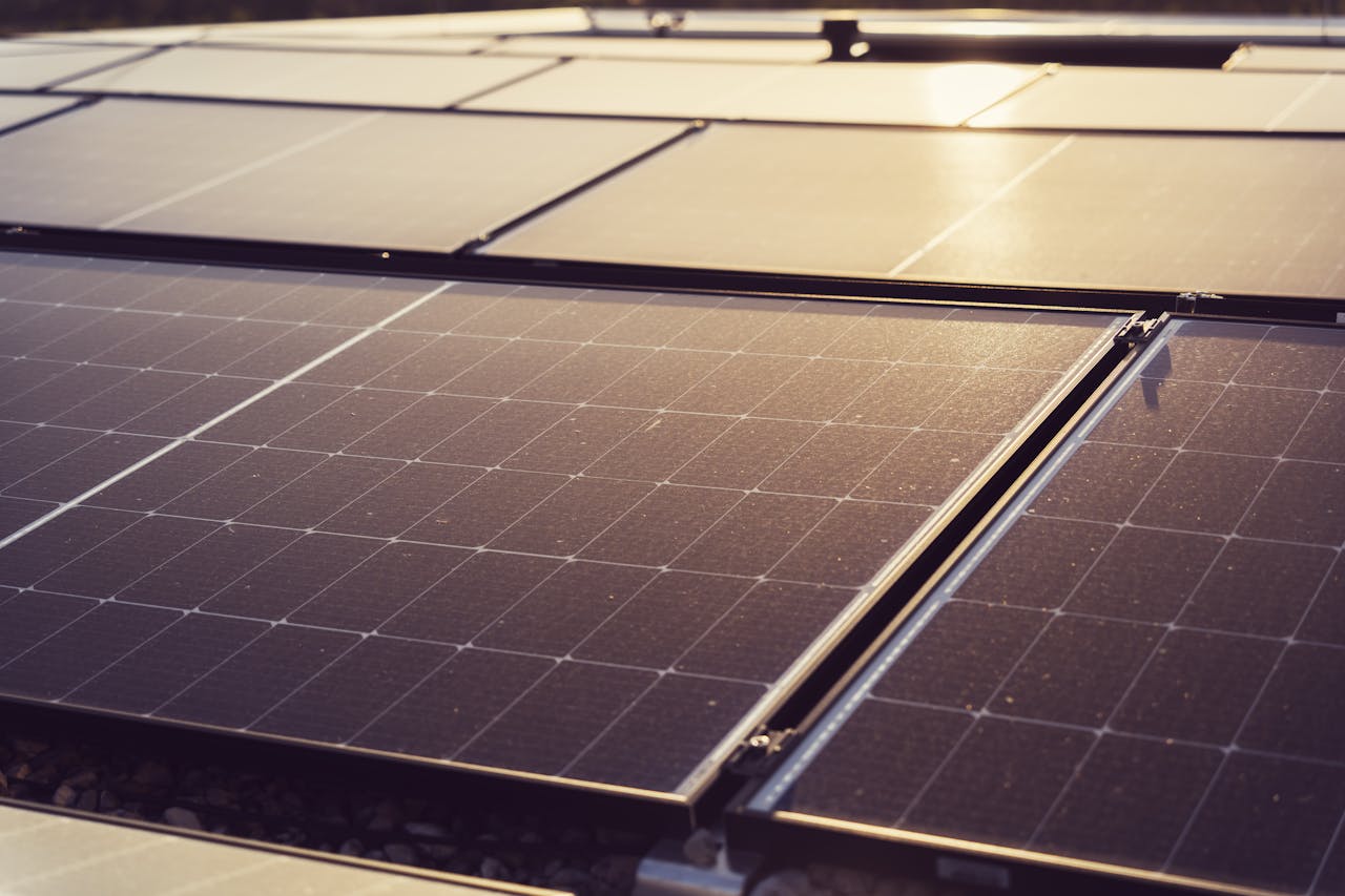 about-01 Detailed view of solar panels capturing sunlight, highlighting renewable energy technology.