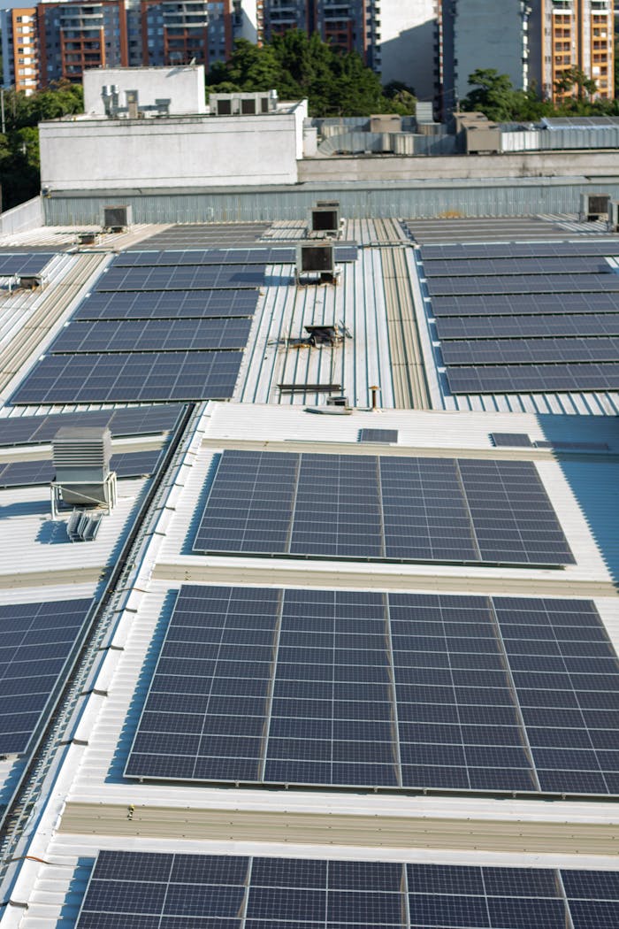 services-03 Aerial view of solar panels on an urban rooftop in Valle del Cauca, Colombia.